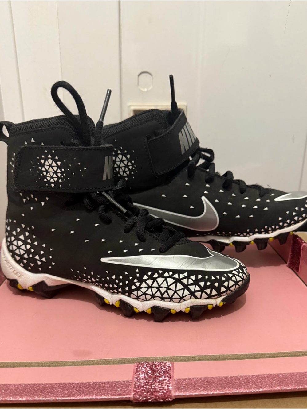 Nike Kids Black and Silver High-Top Soccer Cleats with Geometric Detail